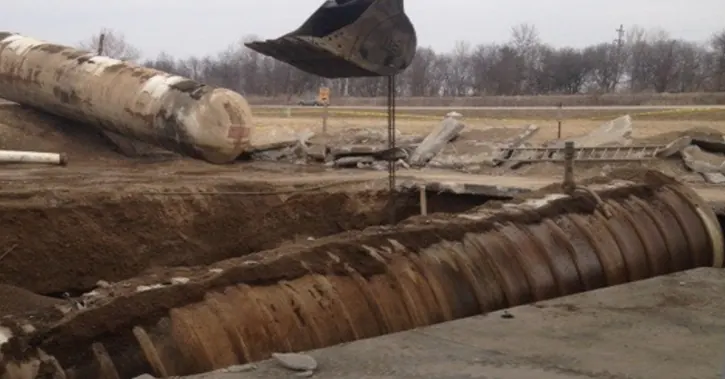Steel underground storage tank exposed during removal